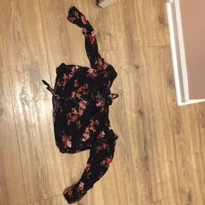 It is a crop top over the shoulders shirt